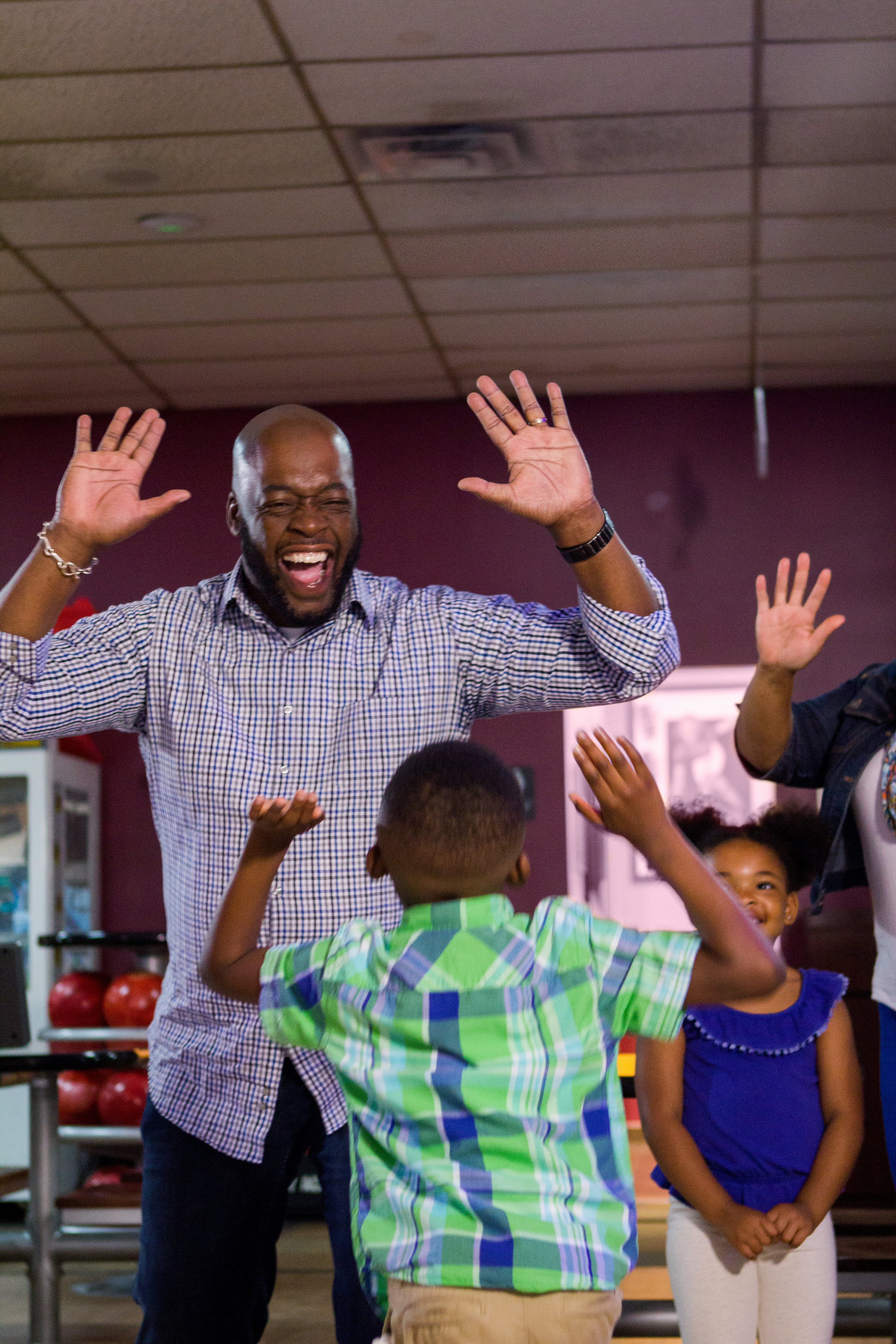 A family giving high fives